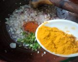 A picture of step 4 of Aloo Baingan.