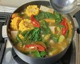 Foto langkah ke 3 dari resep Sayur asam daun Singkil.