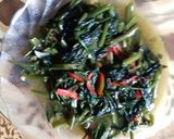 Foto langkah ke 5 dari resep Tumis kangkung saus tiram.