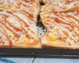 Foto langkah ke 4 dari resep Pizza roti simple.