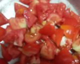A picture of step 1 of Tamatar Aloo ki sabji OR SUBJI E BAHAR.