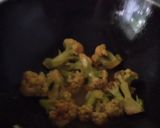 A picture of step 3 of Fish curry with potatoes and cauliflower.