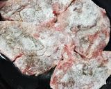 A picture of step 2 of Mushroom marsala pork chops.