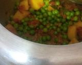 A picture of step 2 of Aloo matar ki sabji.