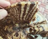 A picture of step 8 of Zebra Cake.