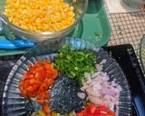 A picture of step 1 of Mexican corn and bean chaat.