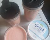 A picture of step 2 of Yogurt Orange juice Strawberry Smoothie.