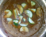 A picture of step 10 of Soft chapati served with beans.