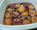 A picture of step 7 of Badhusha (sweet).