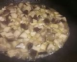 A picture of step 2 of Funghi Gratinati mushrooms with breadcrumbs.