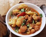 A picture of step 14 of Phulkopi,aloo diye Chhanar Dalna.