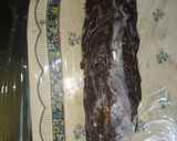 A picture of step 7 of Chocolate and biscuit salami.