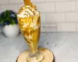 A picture of step 7 of Biscoff milkshake.