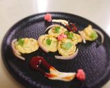 A picture of step 7 of Parmesan chilli duchess potatoes swirl with red pepper sauce.