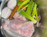 A picture of step 2 of Cook every part - Chicken broth (with some meat) from chicken back/carcass, and wing tips.