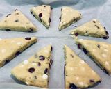 A picture of step 8 of SCONES with red berries & white chocolate chips!! 🍓🥛.