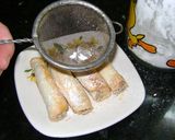Foto del paso 4 de la receta: Arrolladitos rellenos con dulce hechos con discos de empanadas