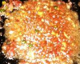 A picture of step 3 of Masala scrambled eggs with cumin rice.