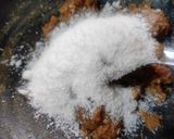 A picture of step 3 of Khajoor coconut peda.
