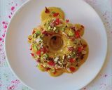 A picture of step 16 of Thandai Bundt cake with Kesar thandai Rabdi frosting.