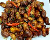 Hình bước làm 6 của món Cá tầm kho tộ với quả cọ