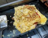Foto del paso 7 de la receta: Omelette de jamón, tomate, roquefort y muzzarella a la plancheta