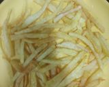 A picture of step 3 of French fries pizza.