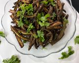 A picture of step 2 of Khichadi with fried bhindi and Papad.