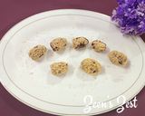 A picture of step 3 of Poppy Seeds covered Dates.