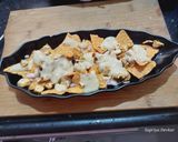 A picture of step 3 of Creamy Fried chicken Nachos.