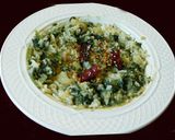 A picture of step 7 of Spinach potato koottu with rice.