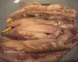 A picture of step 4 of Stir-Fried Baby Squid with Thai Basil.