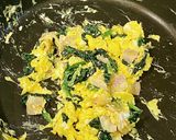 A picture of step 2 of Scrambled eggs with bacon and spinach.