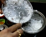 A picture of step 2 of Kaisasive chitranna / coconut mustard rice.