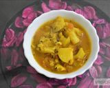 A picture of step 7 of Aloo gobhi curry recipe without onion and garlic.