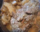 A picture of step 8 of Young Goat Leg with Potatoes, Onions and Gravy.