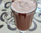 A picture of step 5 of Hershey's chocolate and cocoa milk shake.