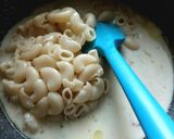 A picture of step 3 of CHEESY GARLIC PASTA in WHITE SAUCE.