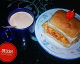 A picture of step 4 of Egg sandwich and a cup of hot tea.