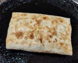 A picture of step 4 of Mexican rice Burrito.
