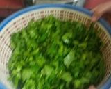 A picture of step 1 of Sarson ka Saag With Makki ki Roti.