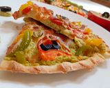 A picture of step 30 of Spinach Hummus Thin Crust Pizza with Hummus Salad.