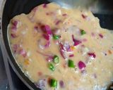 A picture of step 3 of Porota,dimer Omellete.