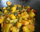 A picture of step 7 of Pumpkin sabji with malabar spinach and prawn.