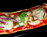 A picture of step 8 of Mike's 10 Minute Salt Brick Pizza Margheritas.