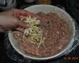 A picture of step 4 of Giant Spaghetti Stuffed Meatball.