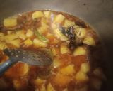 A picture of step 1 of Achari aalu pulao.