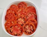 A picture of step 2 of Grilled Tomatoes with cheese.