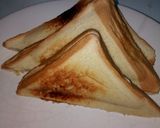 A picture of step 6 of Toasted Bread with Fried Eggs and Baked Beans.