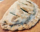 A picture of step 8 of Calzones with Wild Dandelion Greens, Black Olives, and Almonds.
